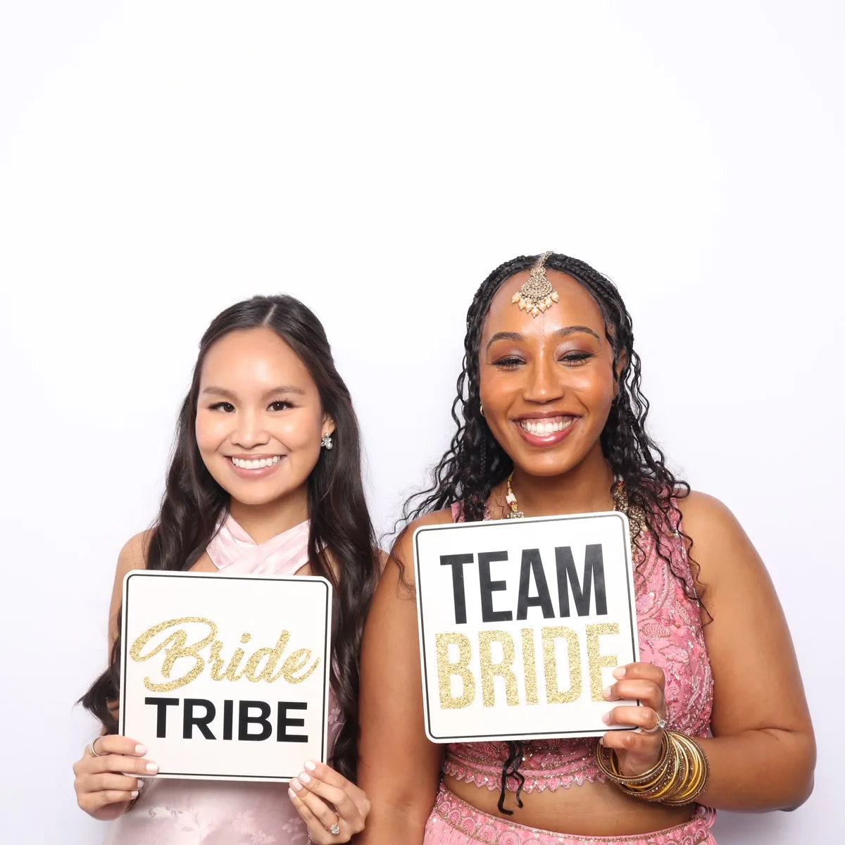 Guests posing at Clutch City luxury booth at Houston party